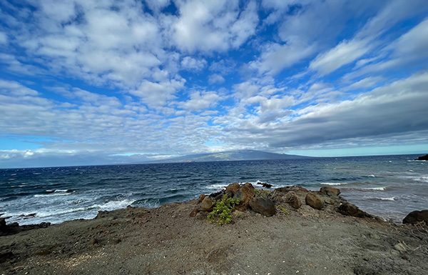 the mountain across the sea is Haleakalā, Maui