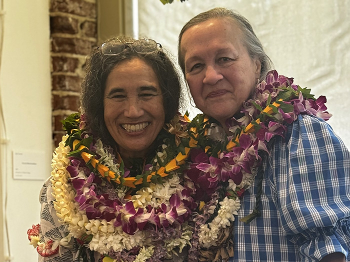 Harinani and Kamalani with lots of lei